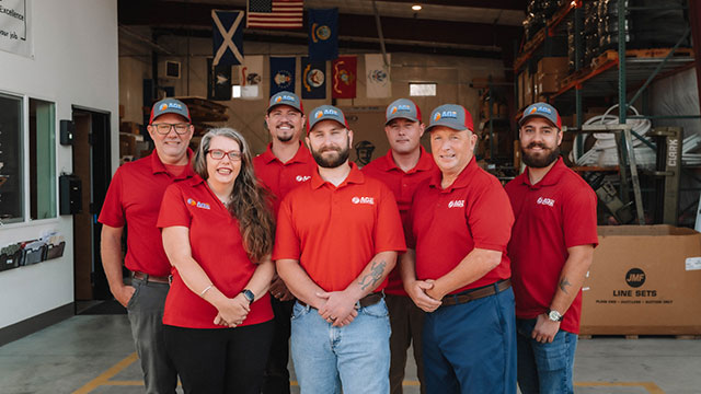 GROUP-PHOTO-640×380 Group photo of the Age team in their shop