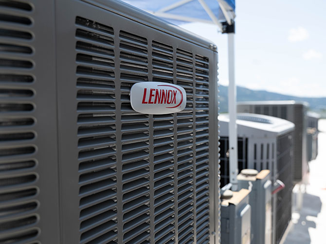 Lennox air conditioner installed on a roof
