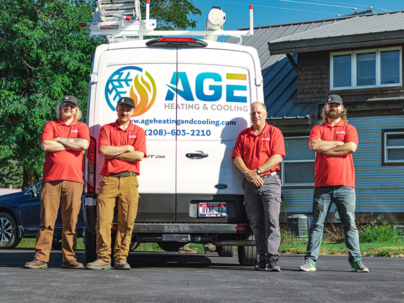 Service techs in front of vans